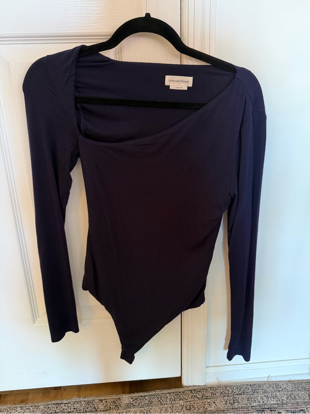 Lovers + Friends Asymmetric Long-Sleeve Top in Deep Navy Bodysuit